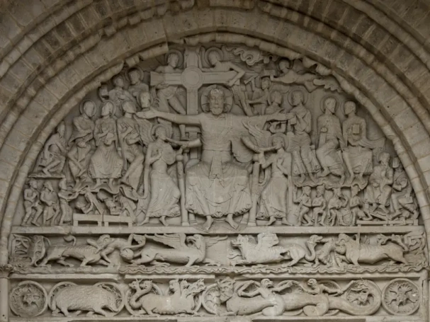 Romanesque stone tympanum of the Abbey Church of Saint-Pierre in Beaulieu-sur-Dordogne, France.